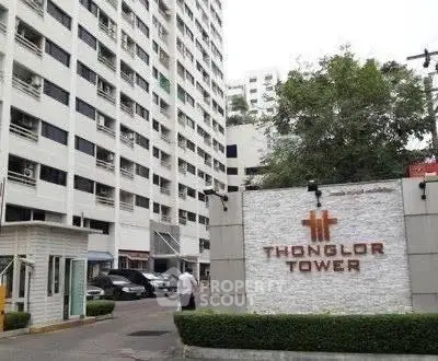 Thonglor Tower exterior view with building and entrance signage