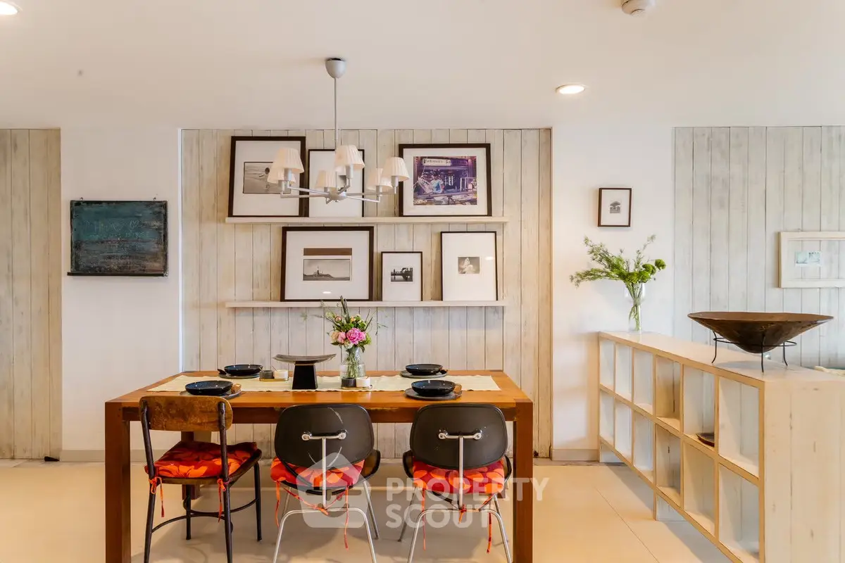 Chic dining area with stylish decor and modern lighting in a cozy home setting.
