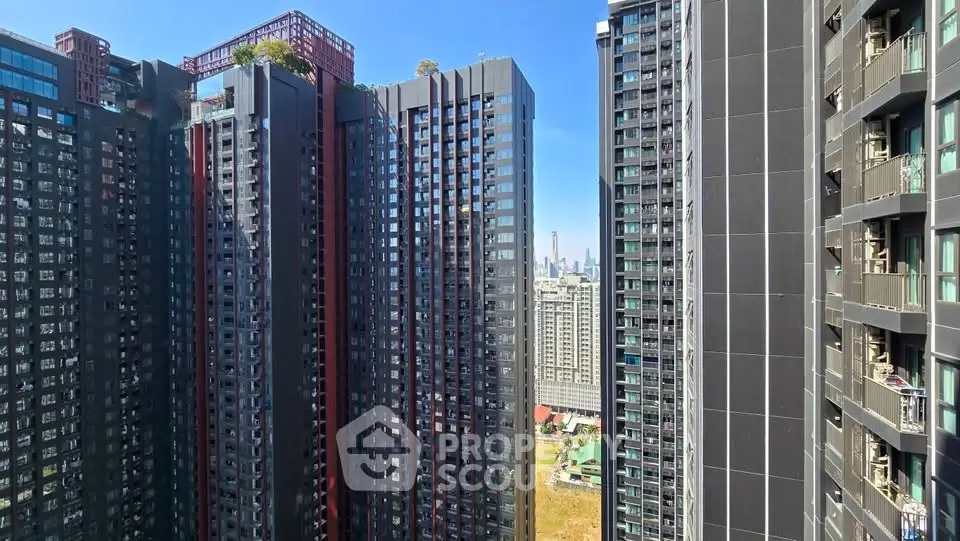 Stunning high-rise buildings with cityscape view, perfect for urban living enthusiasts.