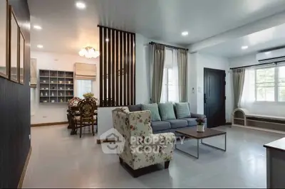 Spacious living room with elegant decor and natural light in modern home