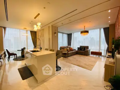 Luxurious open-plan living room with modern kitchen and stunning city views.