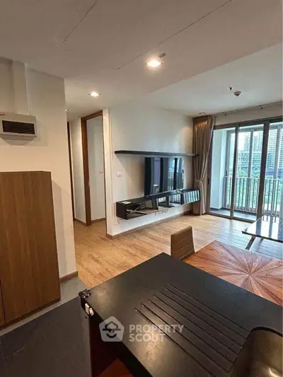 Modern living room with balcony view in a stylish apartment