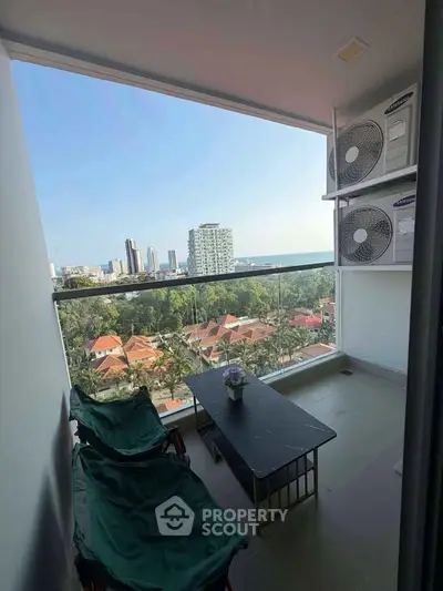 Charming balcony with stunning city view, perfect for relaxation and enjoying the skyline.