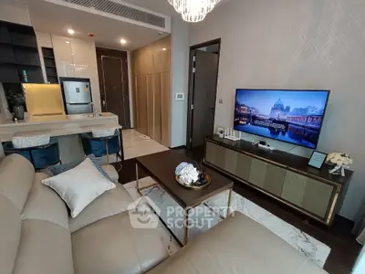 Luxurious modern living room with elegant decor and open kitchen layout