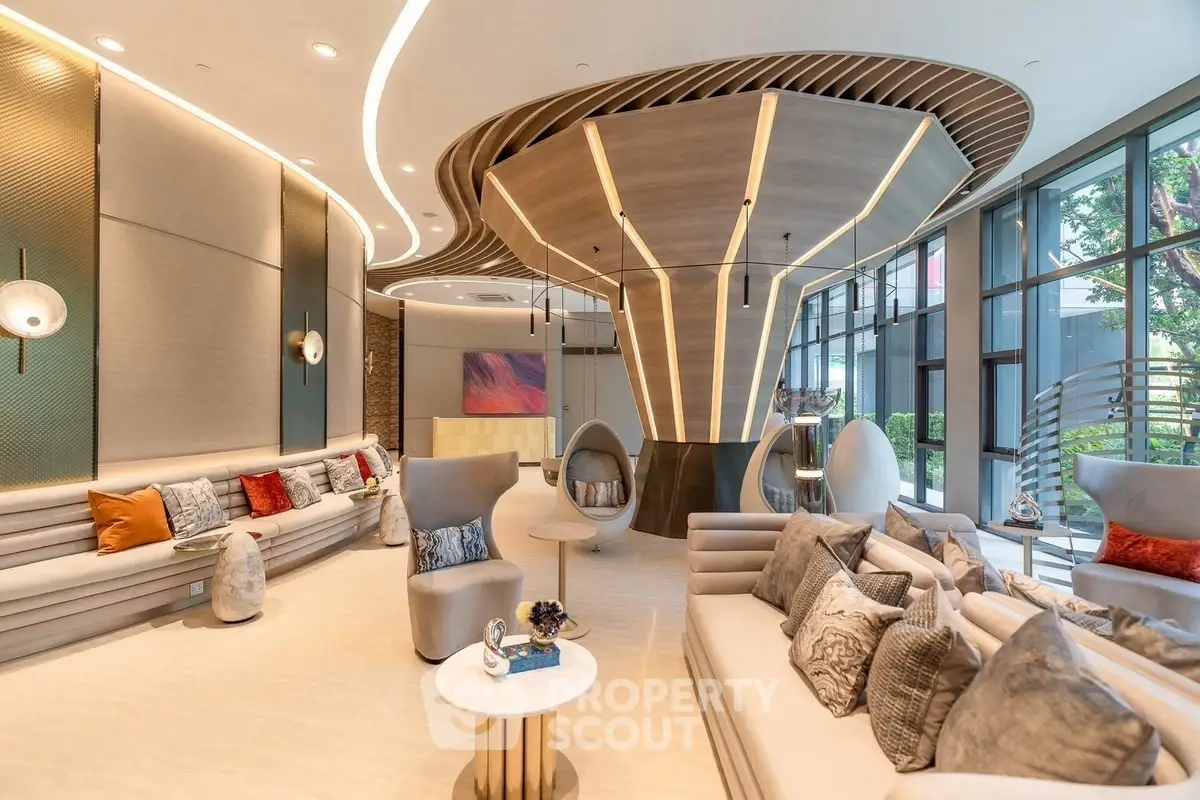 Luxurious modern living room with unique architectural design and elegant furnishings.