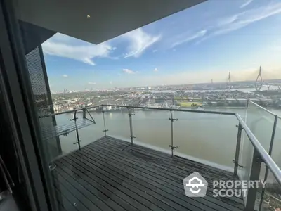 Stunning high-rise balcony with panoramic river and city views