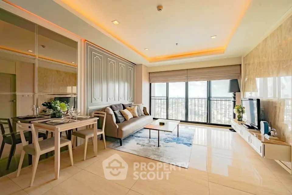 Spacious modern living room with elegant decor and large windows offering a stunning view.