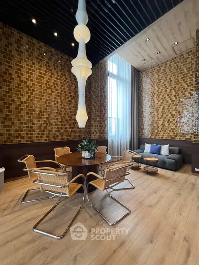 Luxurious modern living room with high ceilings, elegant lighting, and stylish furniture in a sophisticated setting.