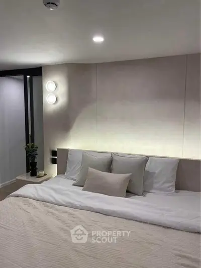 Modern bedroom with cozy lighting and stylish decor