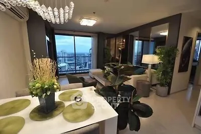 Luxurious modern living room with stunning city view and elegant decor