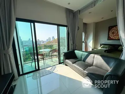 Modern apartment with balcony offering stunning city views and elegant interior design.