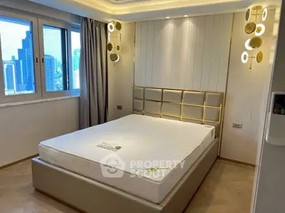 Luxurious bedroom with modern lighting and city view