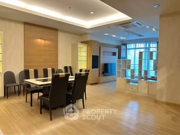 Spacious modern dining room with elegant furniture and open layout