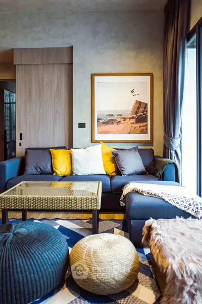 Stylish living room with modern decor and cozy seating area.