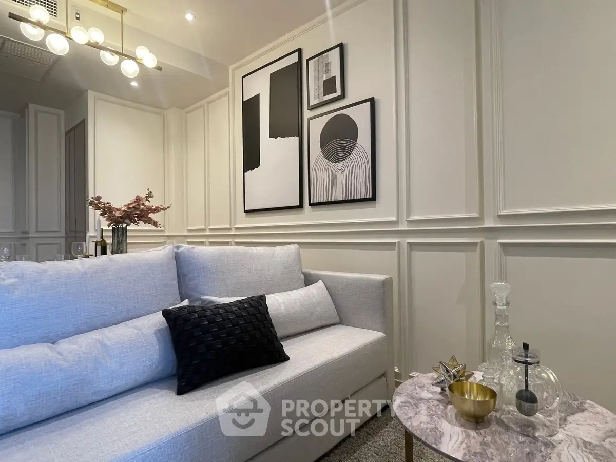 Stylish modern living room with elegant decor and cozy seating area.