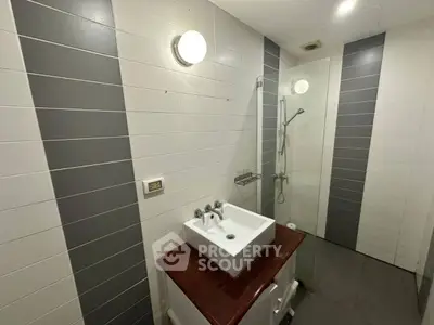Modern bathroom with sleek design and glass shower enclosure