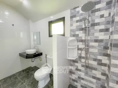 Modern bathroom with sleek shower and stylish tile design