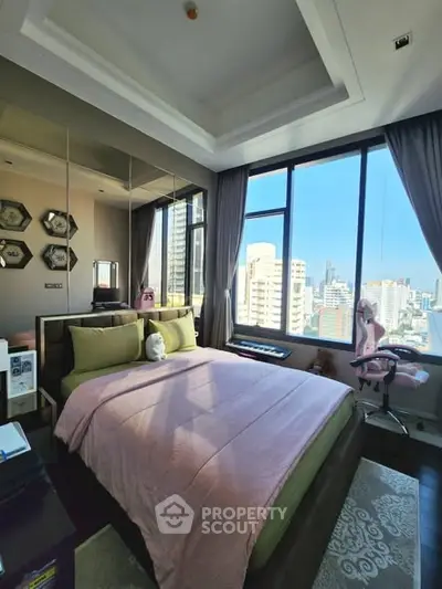 Luxurious bedroom with stunning city view and elegant decor