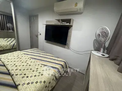 Cozy bedroom with air conditioning and modern decor
