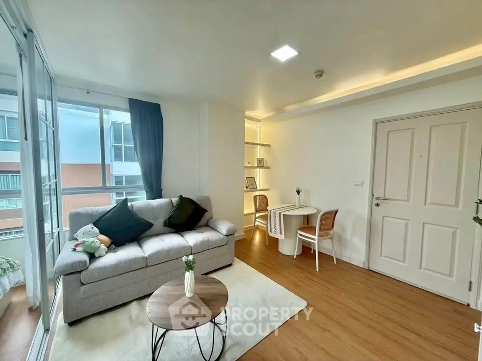 Modern living room with cozy sofa and stylish decor in a bright apartment