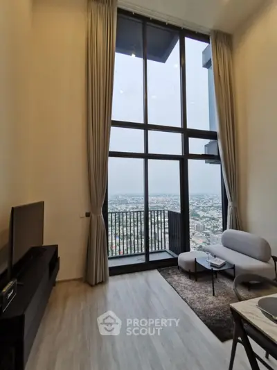 Stunning high-rise living room with floor-to-ceiling windows and breathtaking city view.