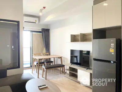 Modern apartment interior with sleek furnishings, including a stylish dining set, contemporary living area, and state-of-the-art kitchen appliances.