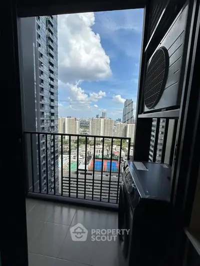 High-rise balcony with stunning city view and laundry area