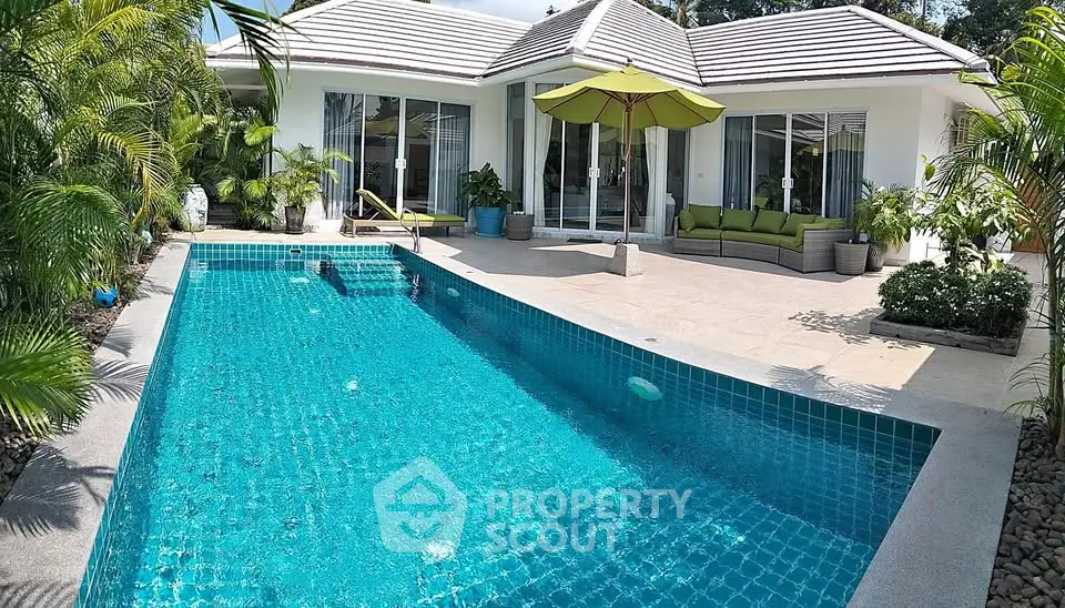 Luxurious villa with private pool and spacious patio, perfect for relaxation and entertaining.