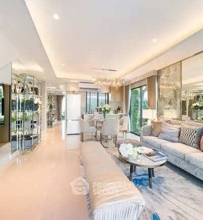 Luxurious open-plan living room with elegant decor and modern furnishings, perfect for sophisticated living.