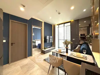 Modern open-plan living room with dining area and city view, featuring elegant decor and ample natural light.