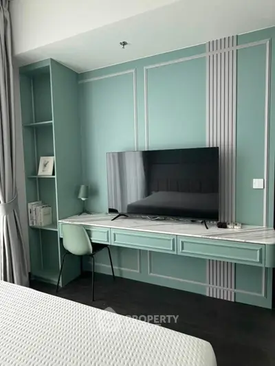 Modern bedroom with stylish built-in TV unit and elegant decor