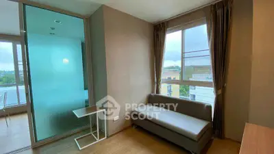 Modern apartment interior with large windows and stylish furniture