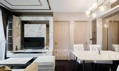 Luxurious modern living room with elegant marble accents and stylish furniture