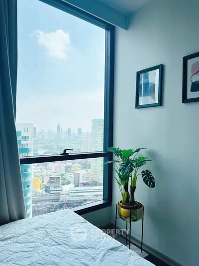Modern bedroom with stunning city view and stylish decor