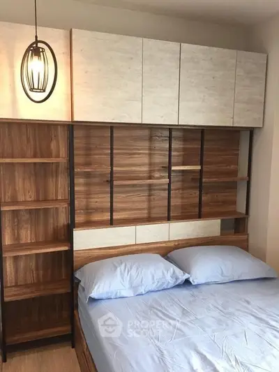 Modern bedroom with stylish wooden headboard and cozy lighting