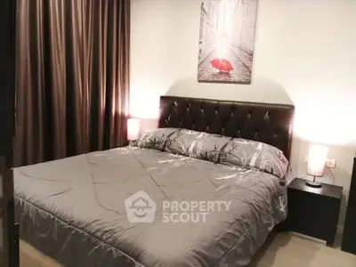 Cozy bedroom with elegant decor and ambient lighting, perfect for relaxation.