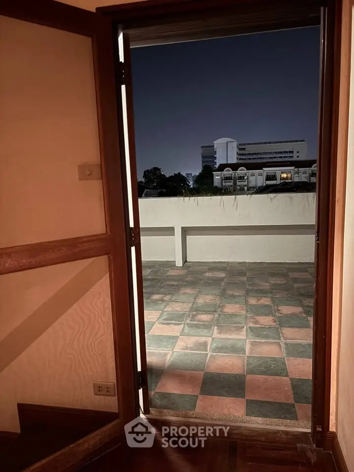 Spacious balcony with city view, perfect for relaxation and entertainment.