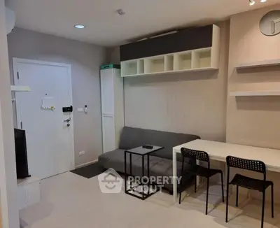 Modern living room with sleek furniture and neutral tones, perfect for urban living.