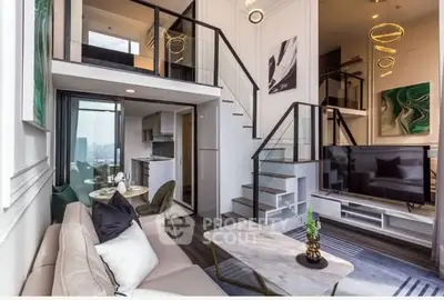 Modern duplex living room with stylish decor and open kitchen layout