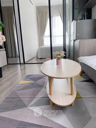 Modern living room with stylish decor and natural light