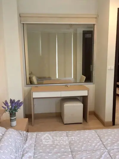 Cozy bedroom with stylish vanity and modern decor