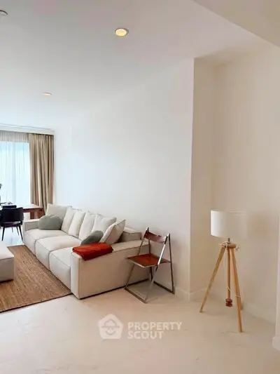 Modern living room with cozy sofa and stylish decor in a bright apartment