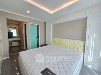 Modern bedroom with stylish decor and natural light