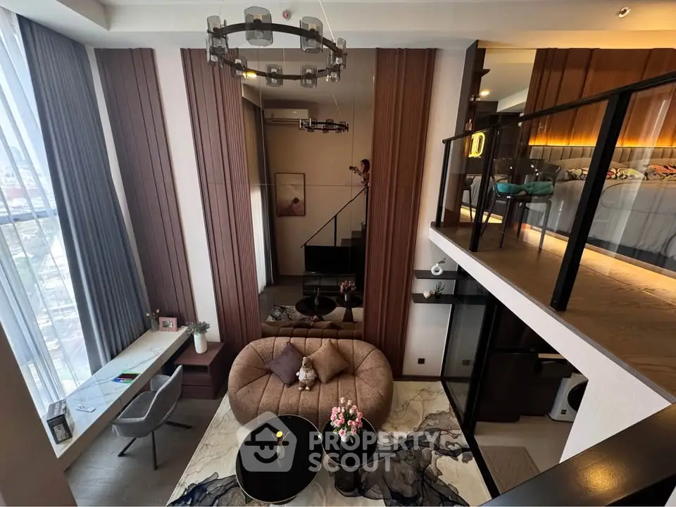 Luxurious modern loft with mezzanine bedroom and stylish living area