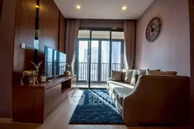 Modern living room with balcony view in high-rise apartment