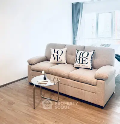 Modern living room with cozy sofa and stylish decor