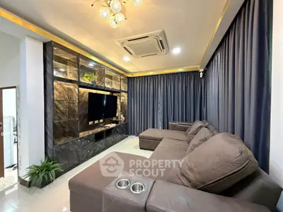 Luxurious living room with plush seating and elegant decor, perfect for relaxation and entertainment.