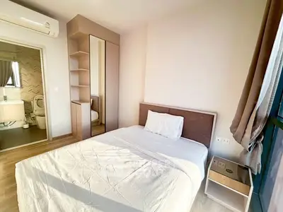 Cozy bedroom with ensuite bathroom and natural light