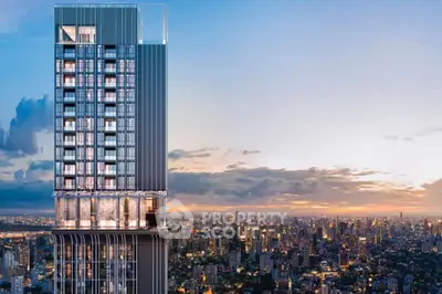 Stunning high-rise building with panoramic city skyline view at sunset.