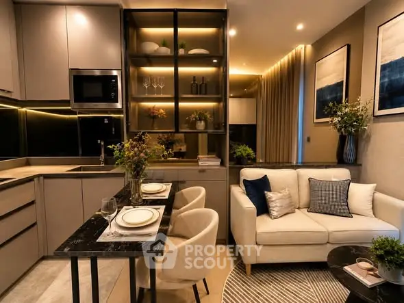 Modern open-plan kitchen and living room with stylish decor and ambient lighting